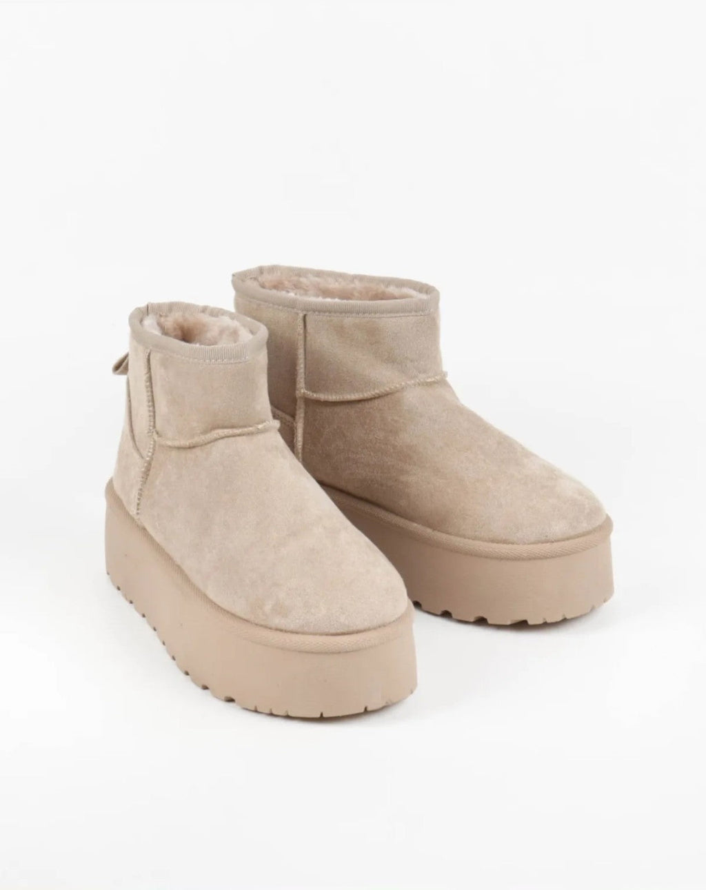 Paire de bottines fourrées plateforme beige