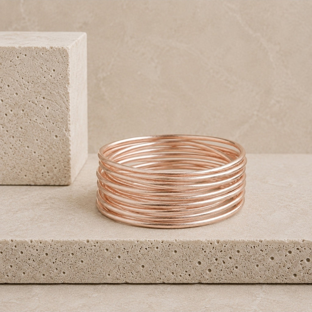 Accumulation de joncs bouddhistes fins 3 mm Rose Gold